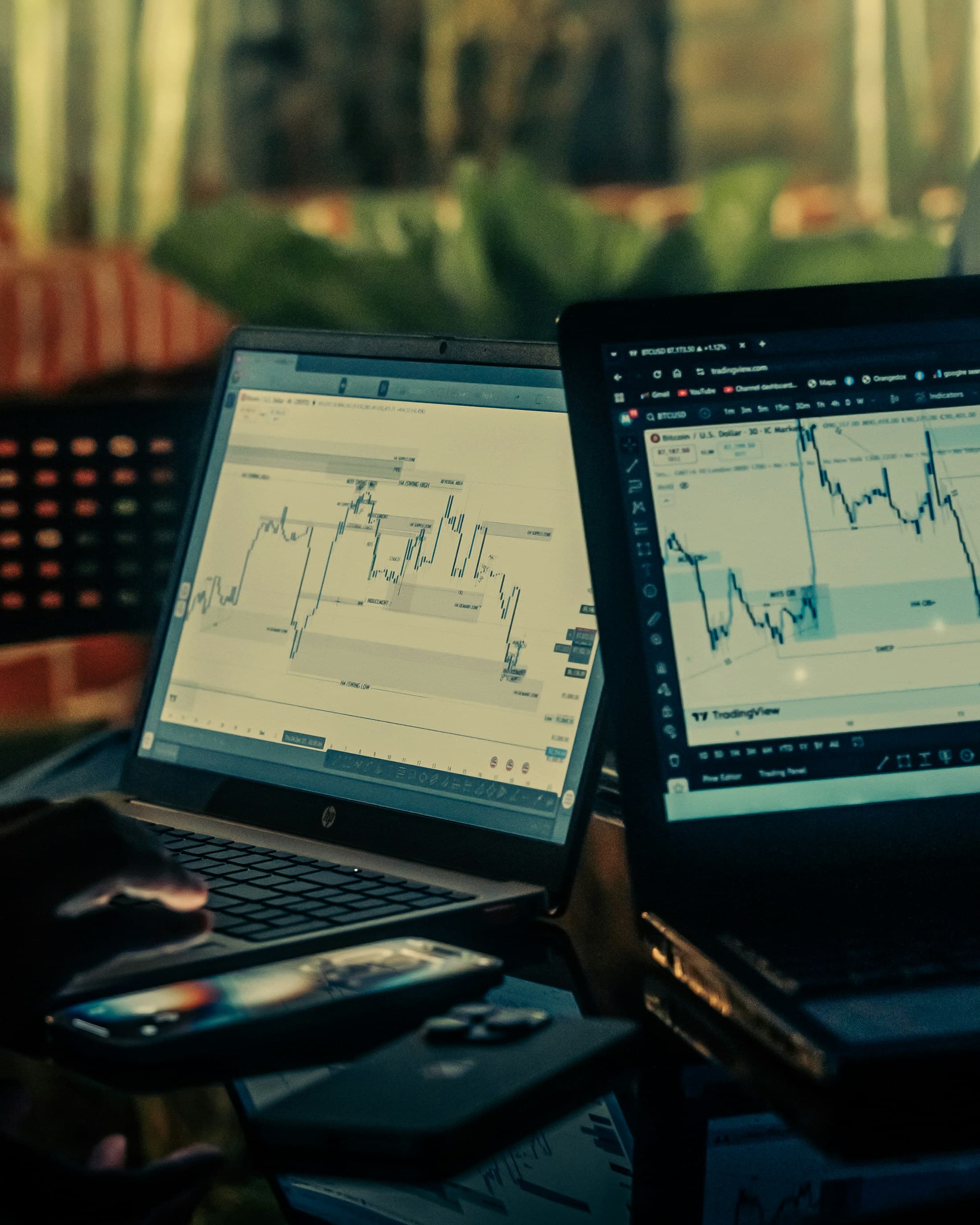 Market charts and portfolio monitors in a professional finance workspace
